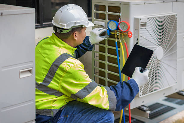 Professional Heat Pump Repair technician working in Juniata, NE